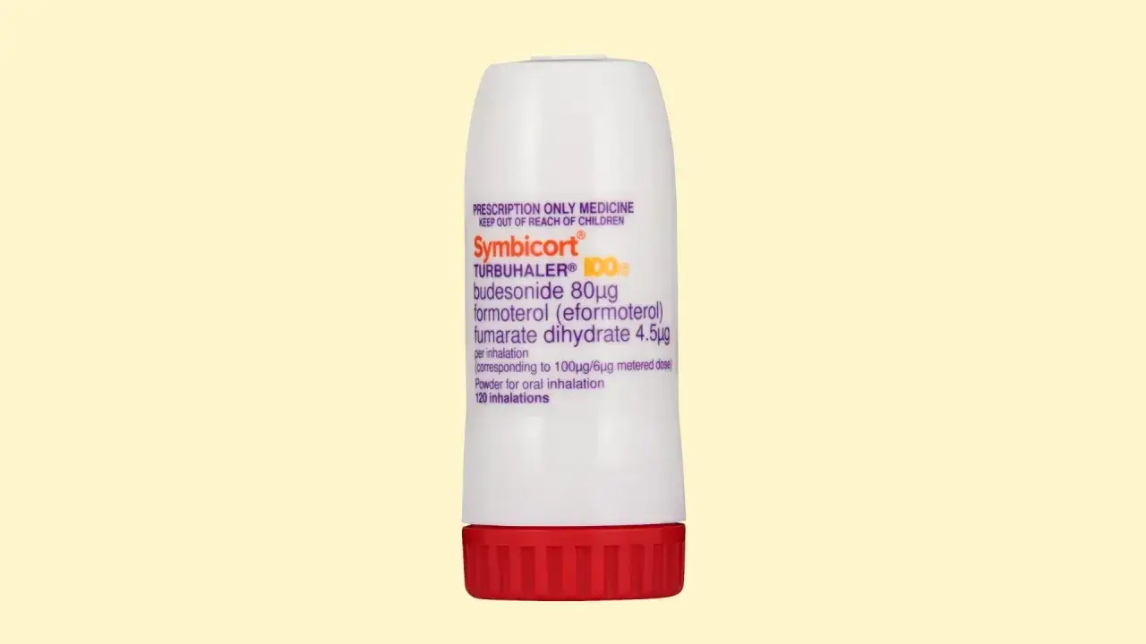 Biały inhalator Symbicort Turbuhaler z czerwonym wieczkiem. Lek na receptę, proszek do inhalacji.