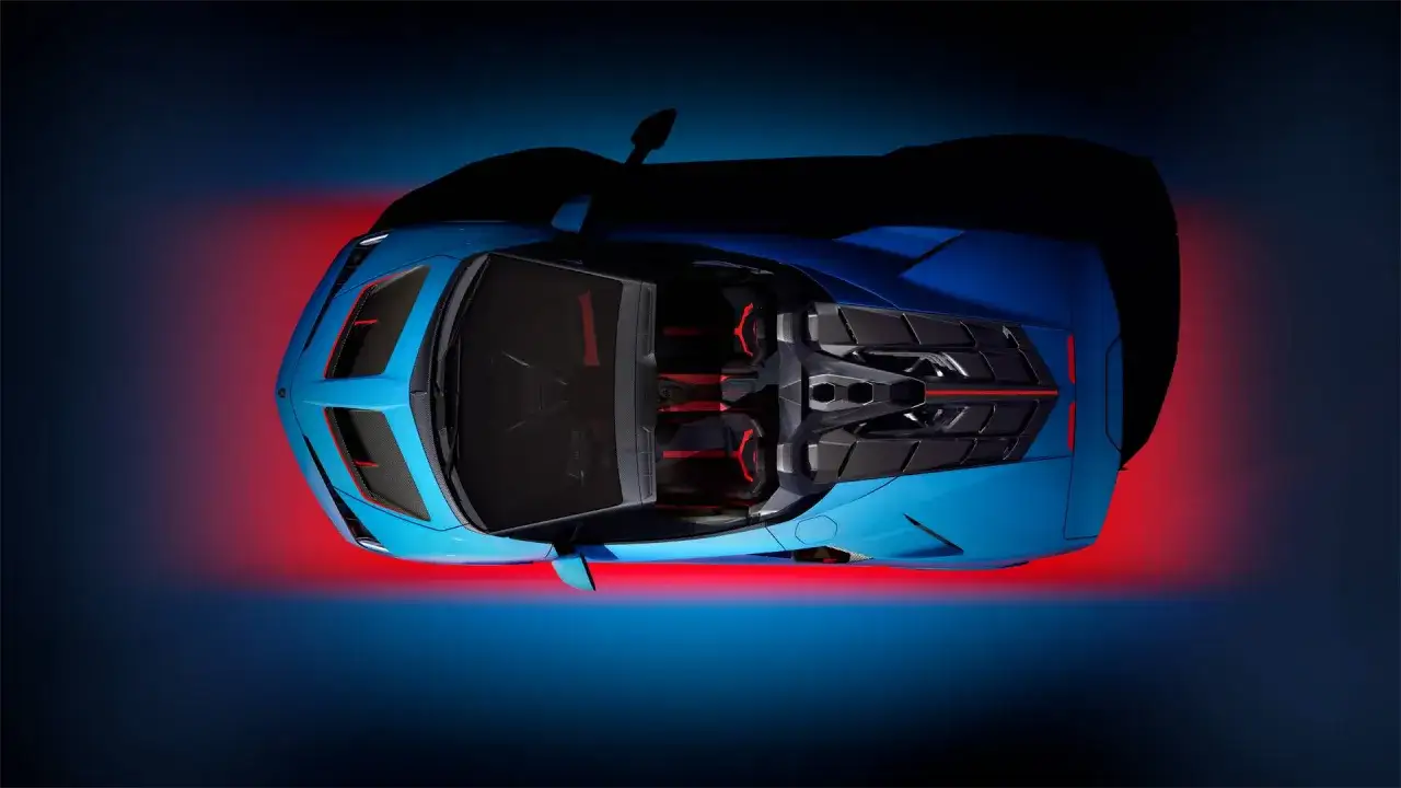 Niebieski Lamborghini Centenario z czerwonymi akcentami, widok z góry, na tle gradientu od niebieskiego do czerwonego.