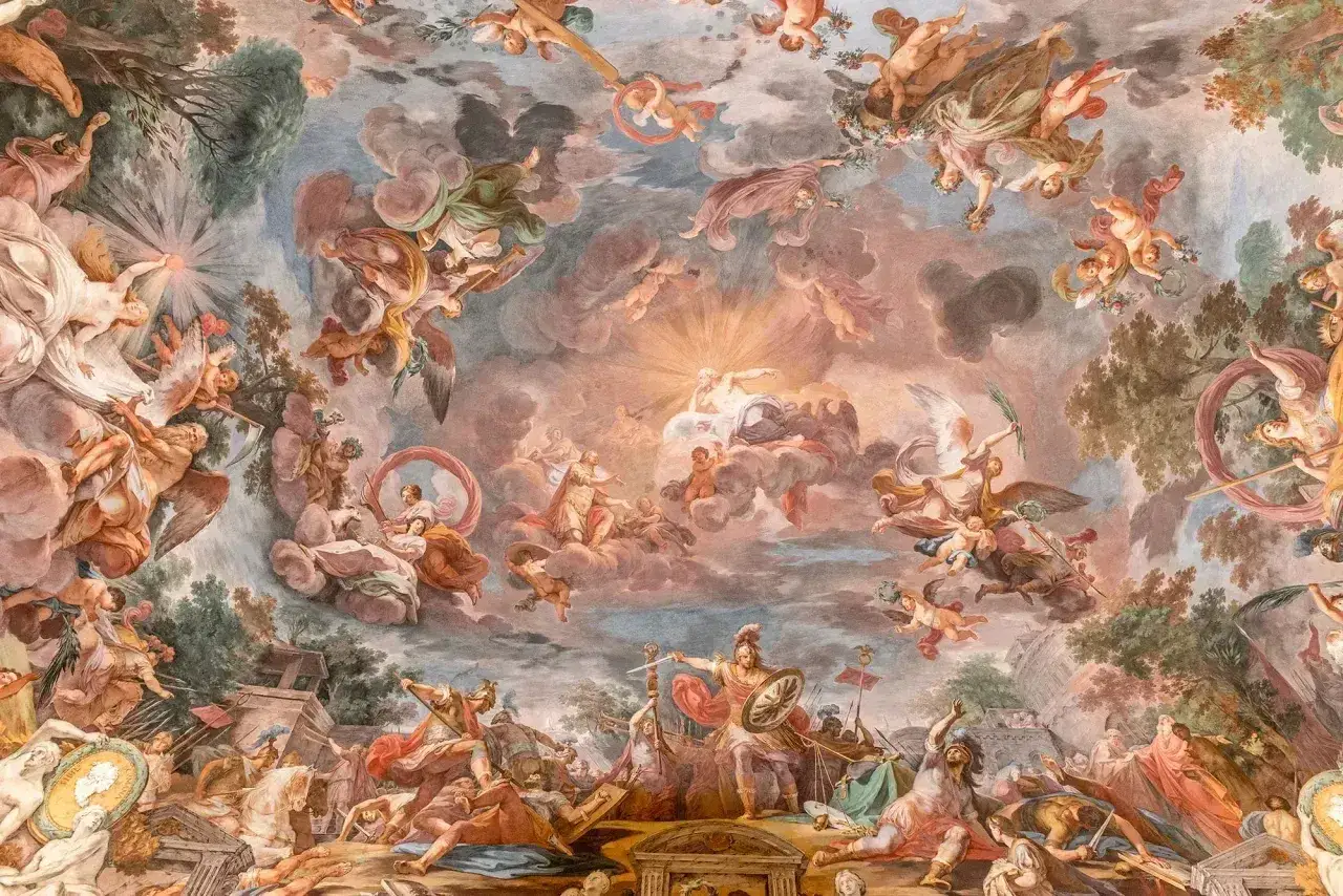 Niebo pełne aniołów i postaci mitologicznych, dynamiczna scena bitwy u dołu. To wizja, co po baroku, w pełnej krasie.