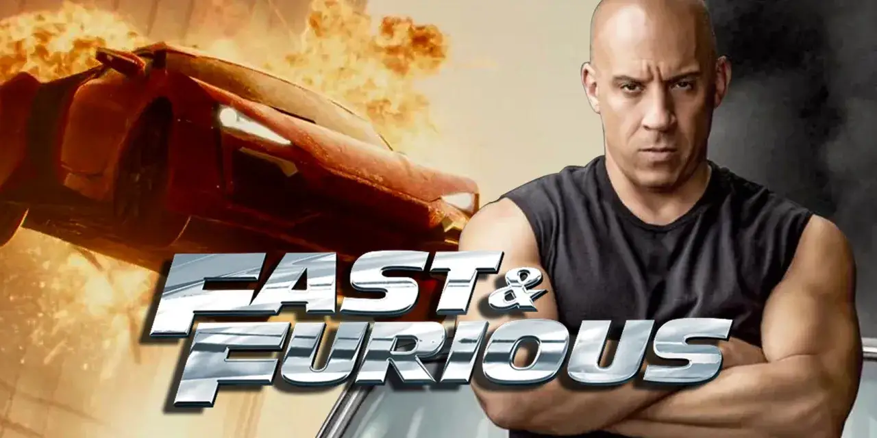 Vin Diesel w czarnej koszulce, obok płonącego samochodu i logo 