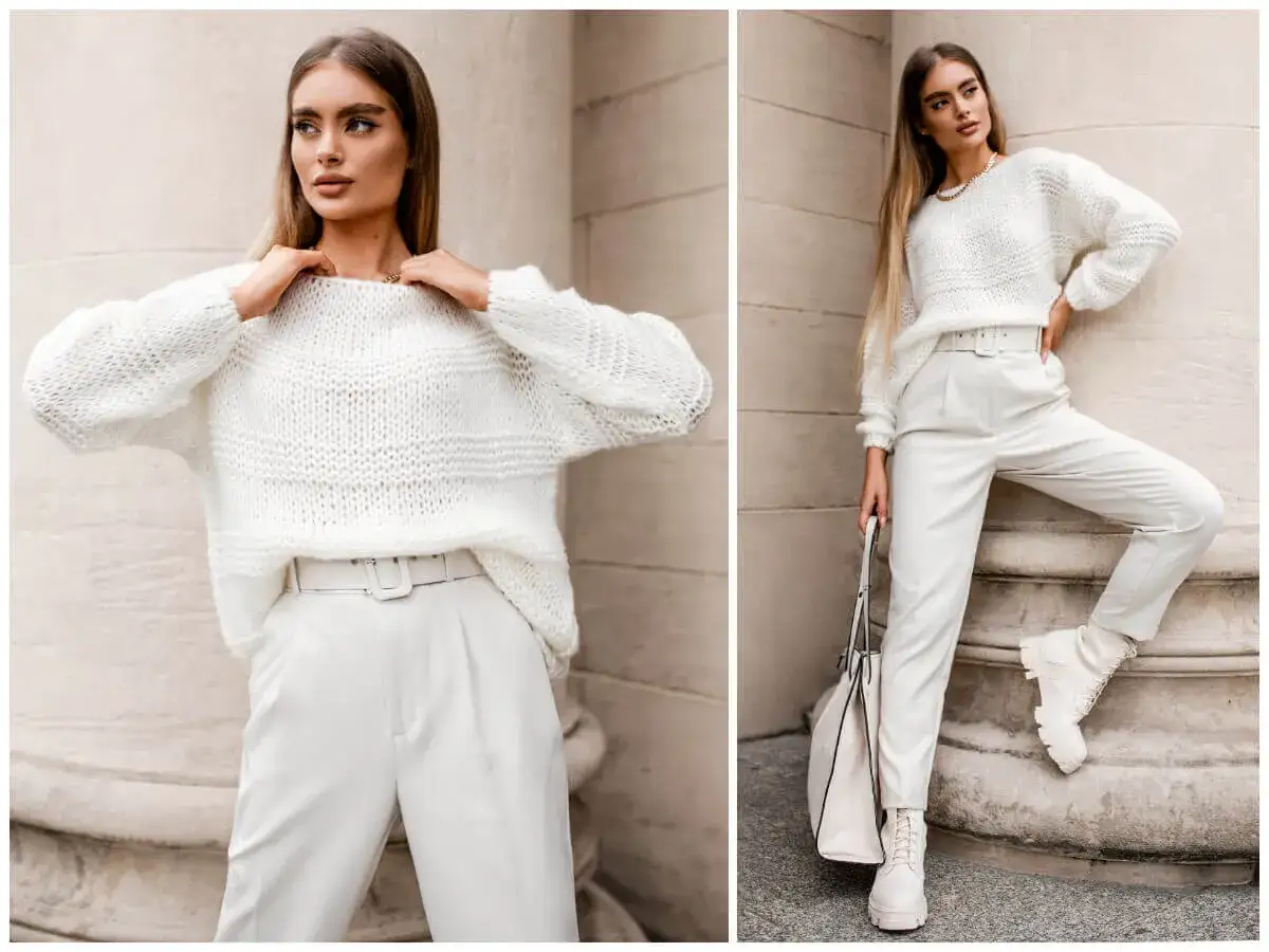 Elegancka kobieta w białym swetrze Gerry Weber i spodniach. Stylizacja na co dzień i na specjalne okazje.