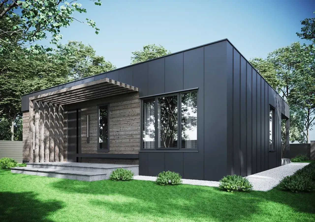 Nowoczesny dom modułowy 100m2 cena pod klucz. Elegancka bryła z drewnianą i grafitową elewacją, otoczona zielenią.