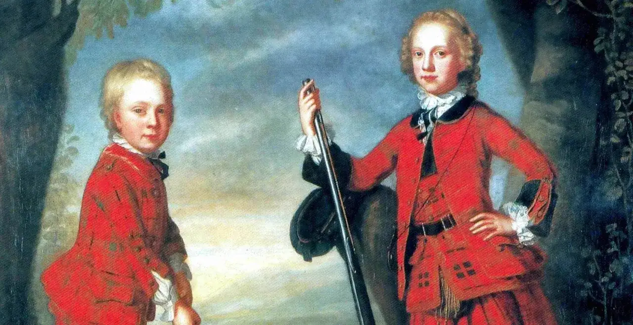 Tv&aring; pojkar i r&ouml;da dr&auml;kter, en h&aring;ller en klubba, en tidig bild av golf historia.