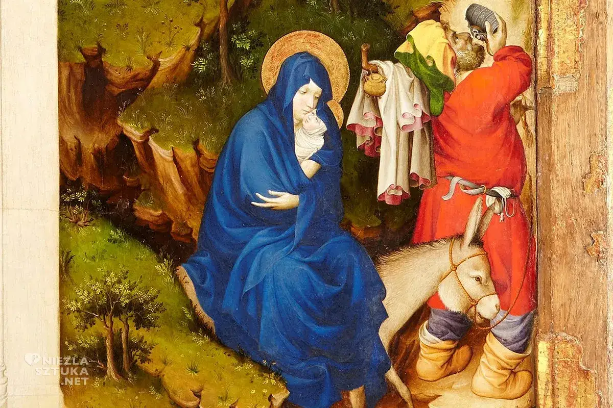 Madonna w błękitnym płaszczu, symbolizującym spokój i wierność, trzyma Dzieciątko. Obok osiołek i postać w czerwonej szacie.
