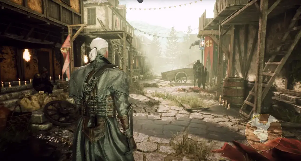 Geralt de Rivia, en el **witcher remake**, camina por un pueblo polvoriento. Antorchas iluminan el camino.
