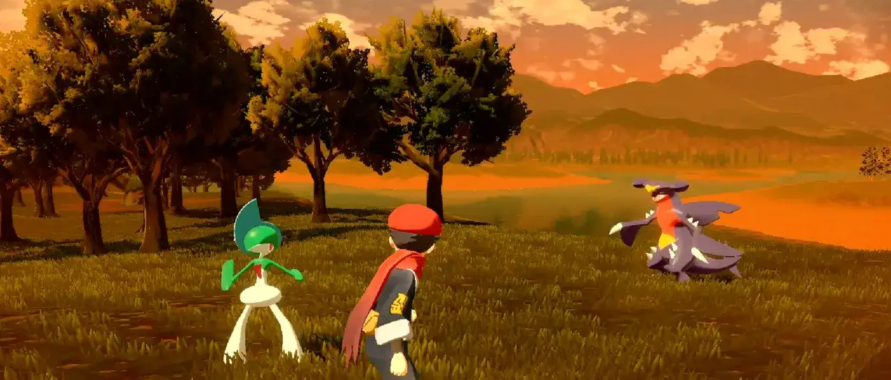 Un entrenador en Hisui, con su Gardevoir y Garchomp, se prepara para un combate. &iexcl;Una escena clave de tu **gu&iacute;a Pok&eacute;mon Arceus**!