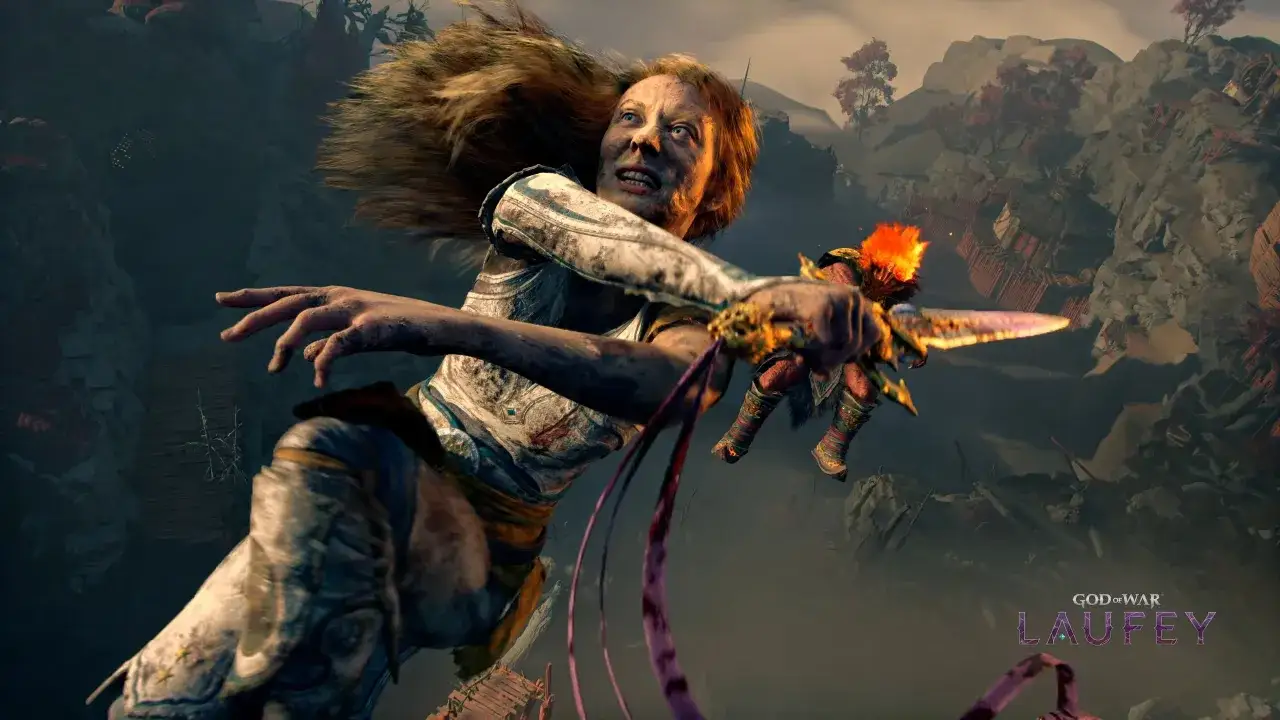 Kobieta z rozwianymi włosami walczy w powietrzu, trzymając płonący sztylet. To scena z gry nowy god of war.