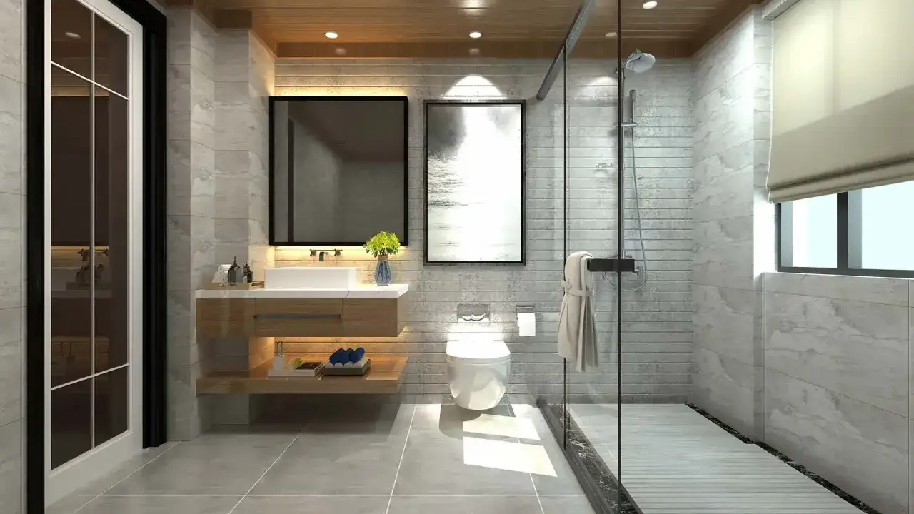 Moderno baño con ducha de cristal, lavabo flotante y WC. Ideal para tu presupuesto baño.