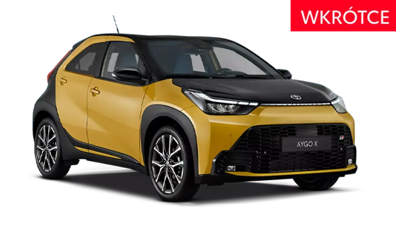 Żółty Toyota Aygo Cross z czarnym dachem i maską, gotowy na miejskie przygody.