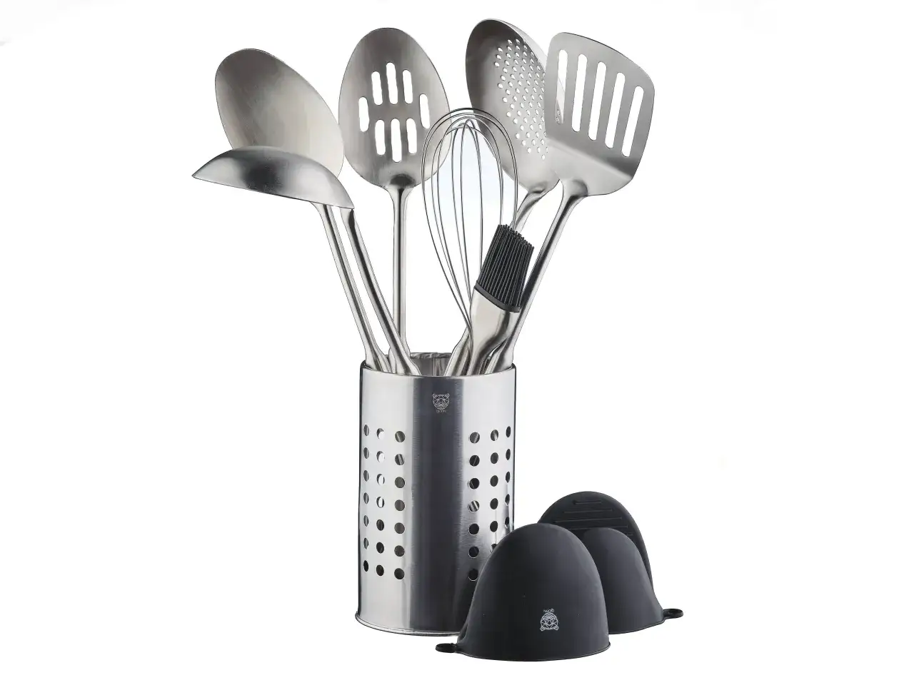 Ensemble d'ustensiles de cuisine en inox austénitique, incluant louche, écumoire, fouet et spatules, dans un pot perforé.