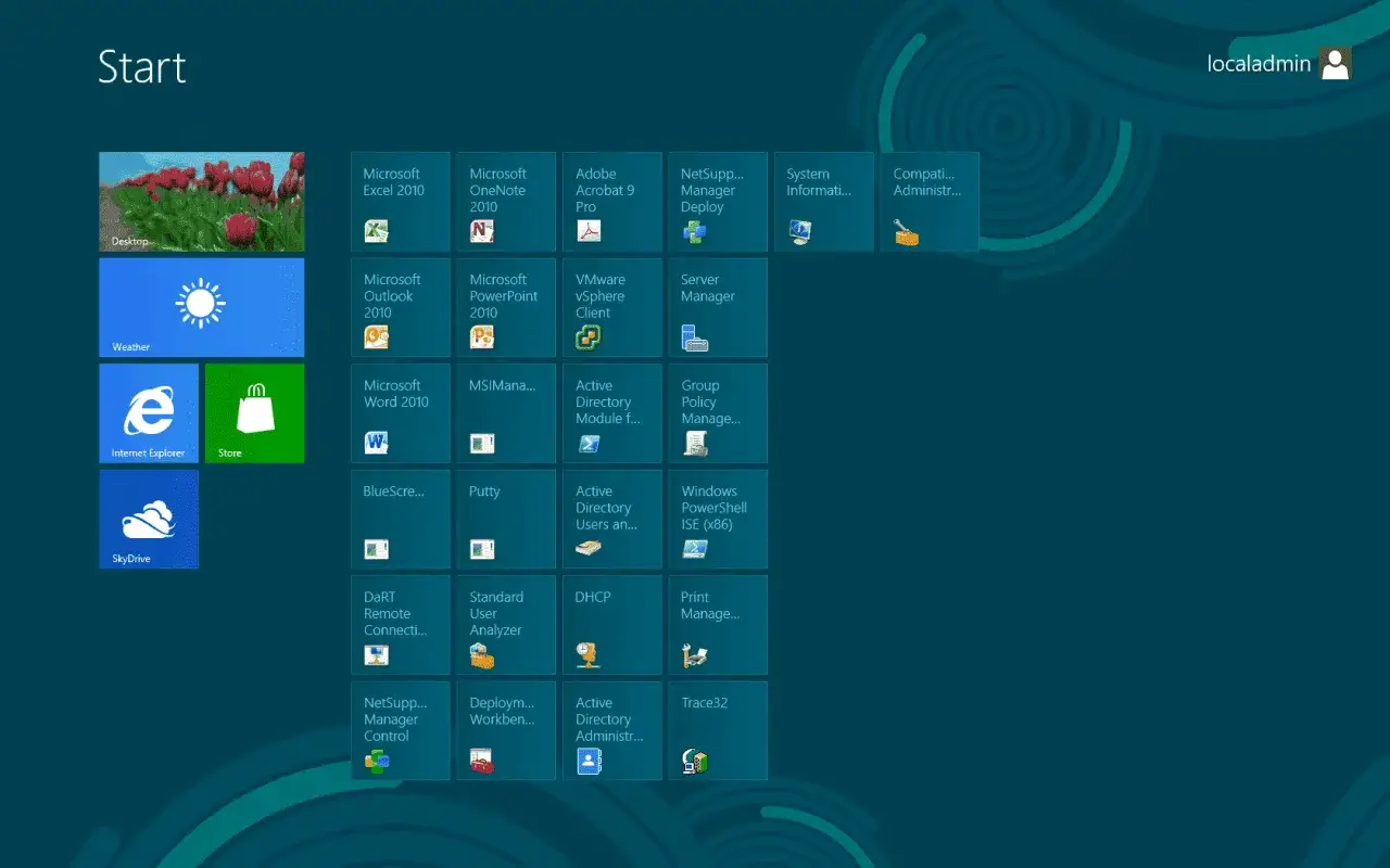 Ekran startowy systemu Windows 8 z kafelkami aplikacji, takimi jak Pogoda, Internet Explorer i Skydrive.
