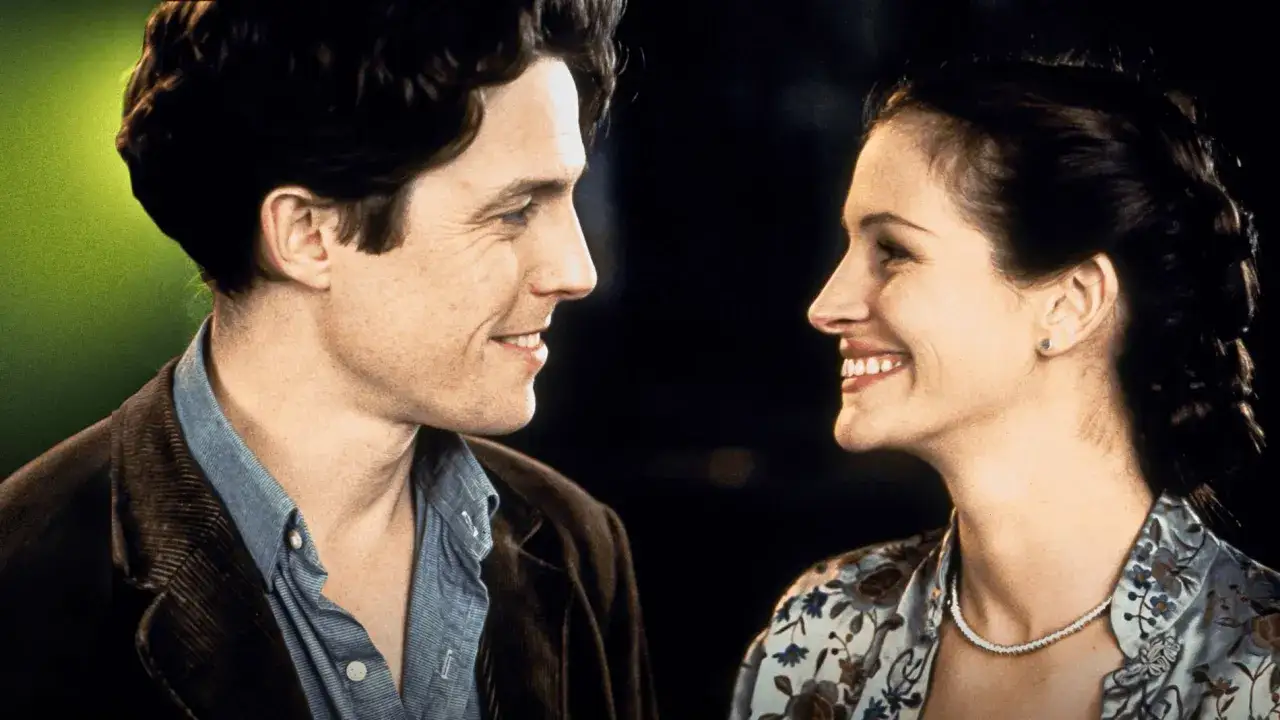 Uśmiechnięci Hugh Grant i Julia Roberts, para z filmu