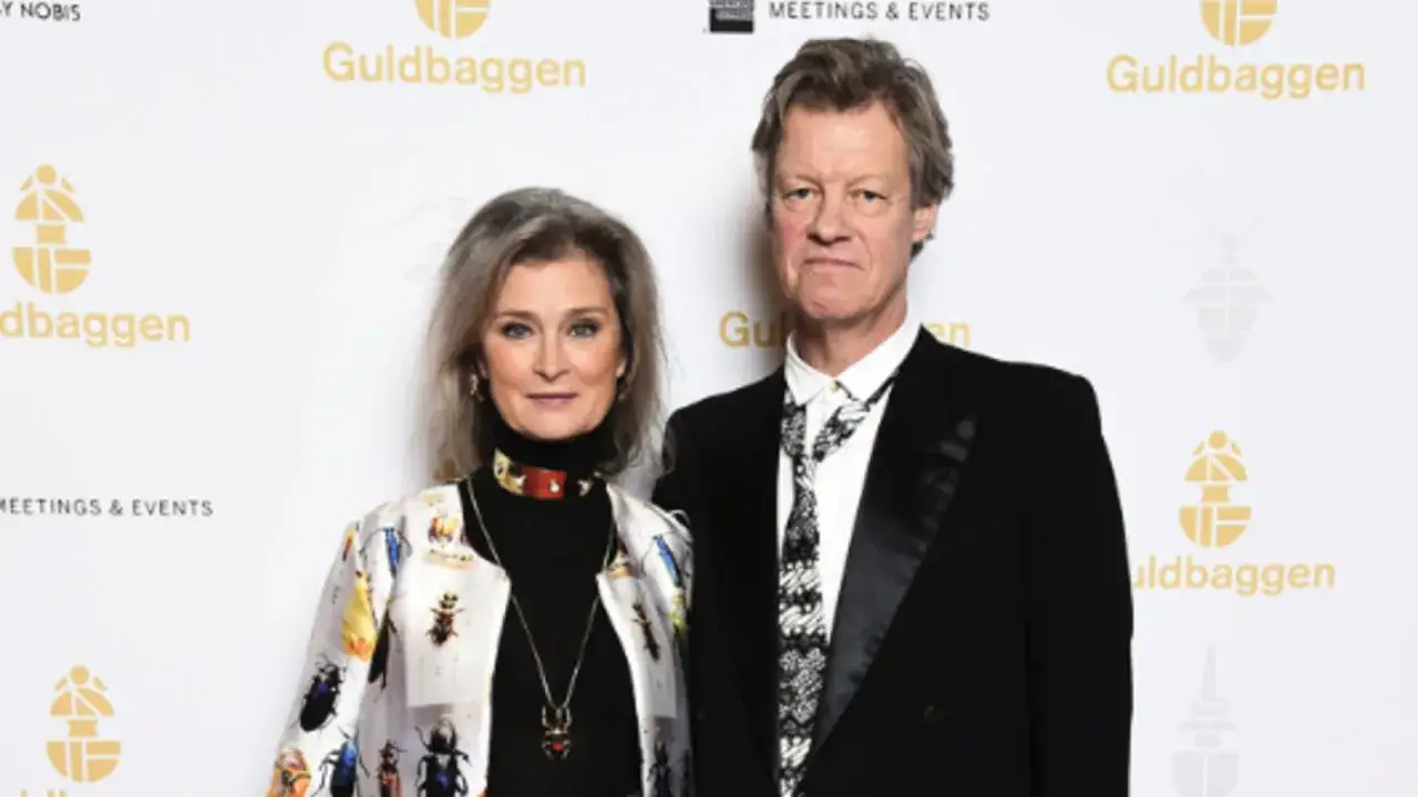 Lena Endre med make på Guldbaggegalan. Hon bär en jacka med insektsmotiv.