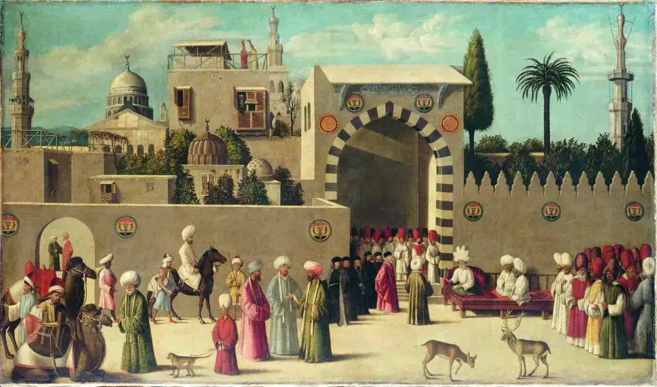 Obraz ukazuje scenę z życia wschodniego, pełną barwnych postaci w turbanach i tradycyjnych strojach, co doskonale ilustruje, czym jest orientalizm.