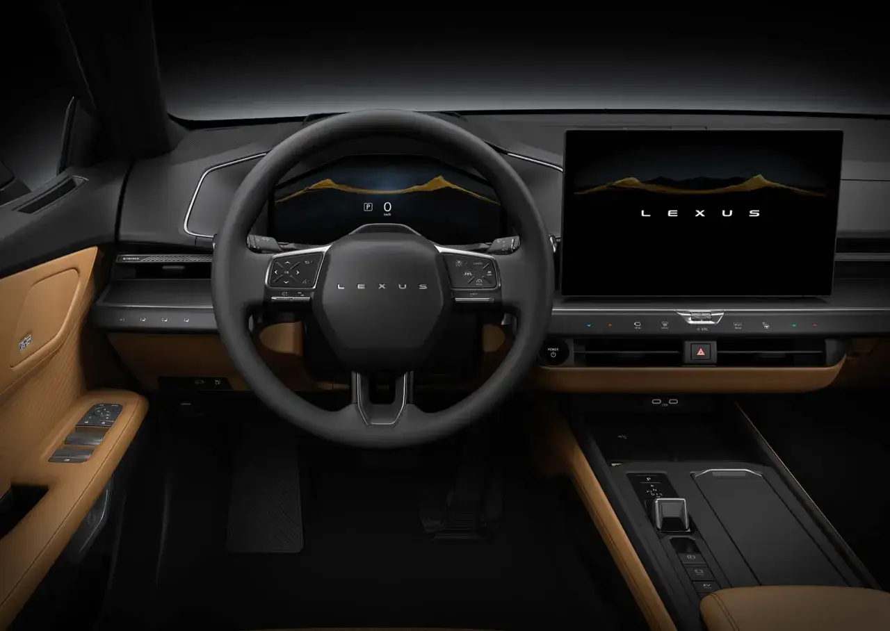 Wnętrze Lexus ES 2026: nowoczesny kokpit z dużym ekranem dotykowym, cyfrowymi zegarami i eleganckimi, brązowymi akcentami.