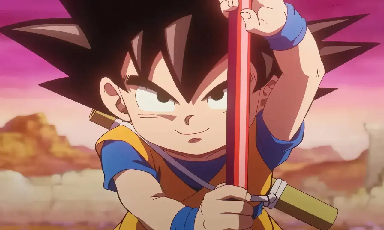 Młody Goku z Dragon Ball, trzymający kij, gotowy do walki. Kolejność przygód zaczyna się od niego!