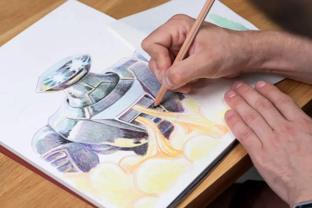 Main d'artiste cr&eacute;ant un robot futuriste avec des crayons de couleur. La texture dessin facile donne vie &agrave; cette armure m&eacute;tallique et aux flammes.