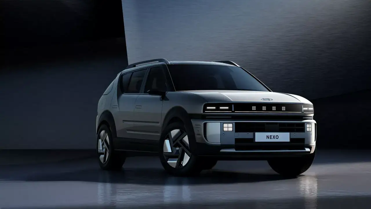 Nowoczesny SUV Hyundai Motor Company, model Nexo, prezentuje futurystyczny design z charakterystycznymi światłami i aerodynamiczną sylwetką.