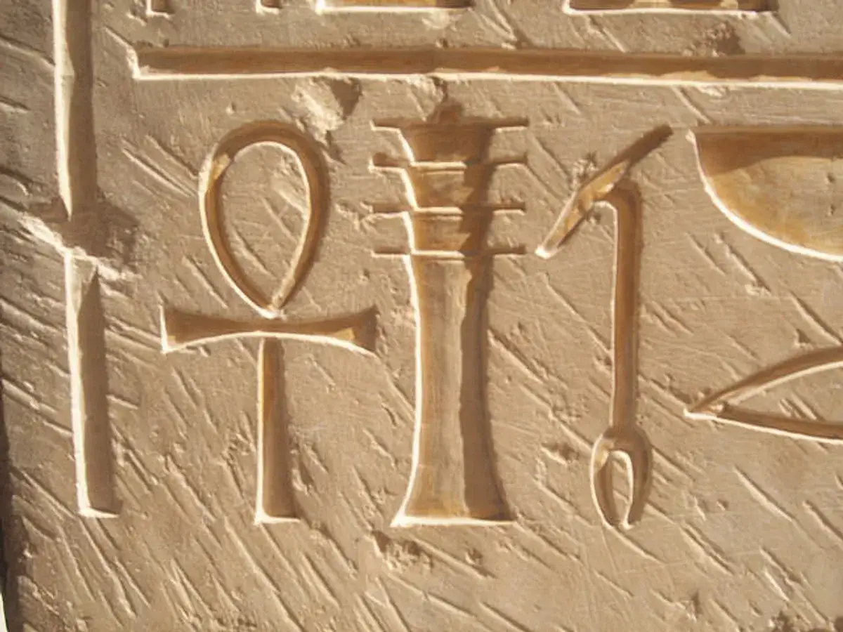Ancient Egyptian hieroglyphs, including the ankh symbol, hint at what is the oldest religion in the world.