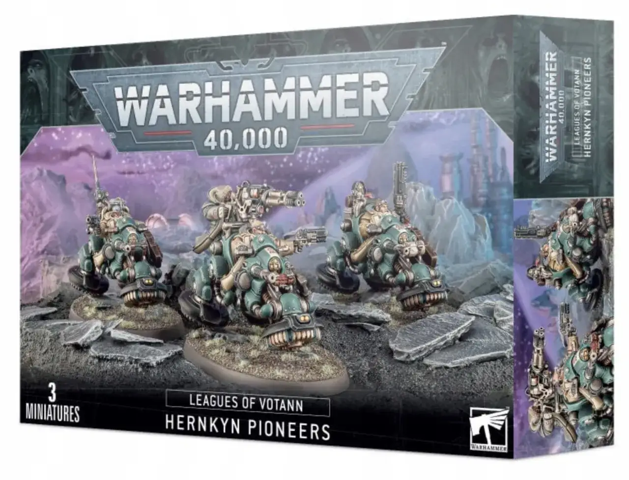 Pudełko z figurkami do gry Warhammer 40,000, przedstawiające trzy pojazdy Leagues of Votann Hernkyn Pioneers. Idealne do figurkowych gier bitewnych.