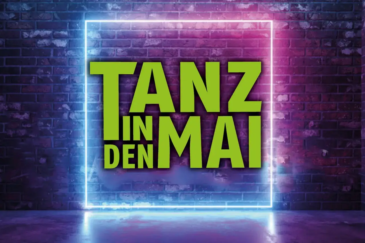Neonlicht umrahmt die gr&uuml;ne Schrift 