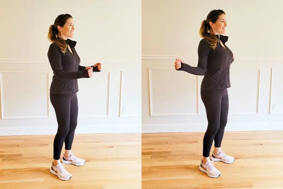 Donna in abiti sportivi, con le braccia piegate e i pugni stretti, sembra avere una sensazione di camminare storto.
