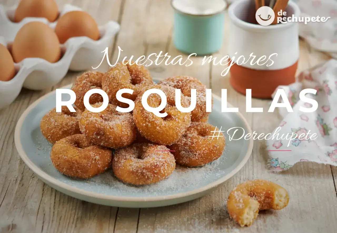 Rosquillas caseras de toda la vida, doradas y espolvoreadas con azúcar, listas para disfrutar.