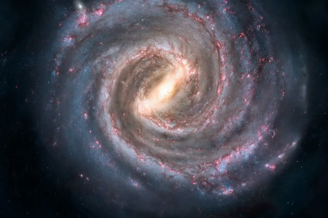 En virvlande vintergatan galax med ljusa armar av stj&auml;rnor och gas, som en kosmisk dans i m&ouml;rkret.