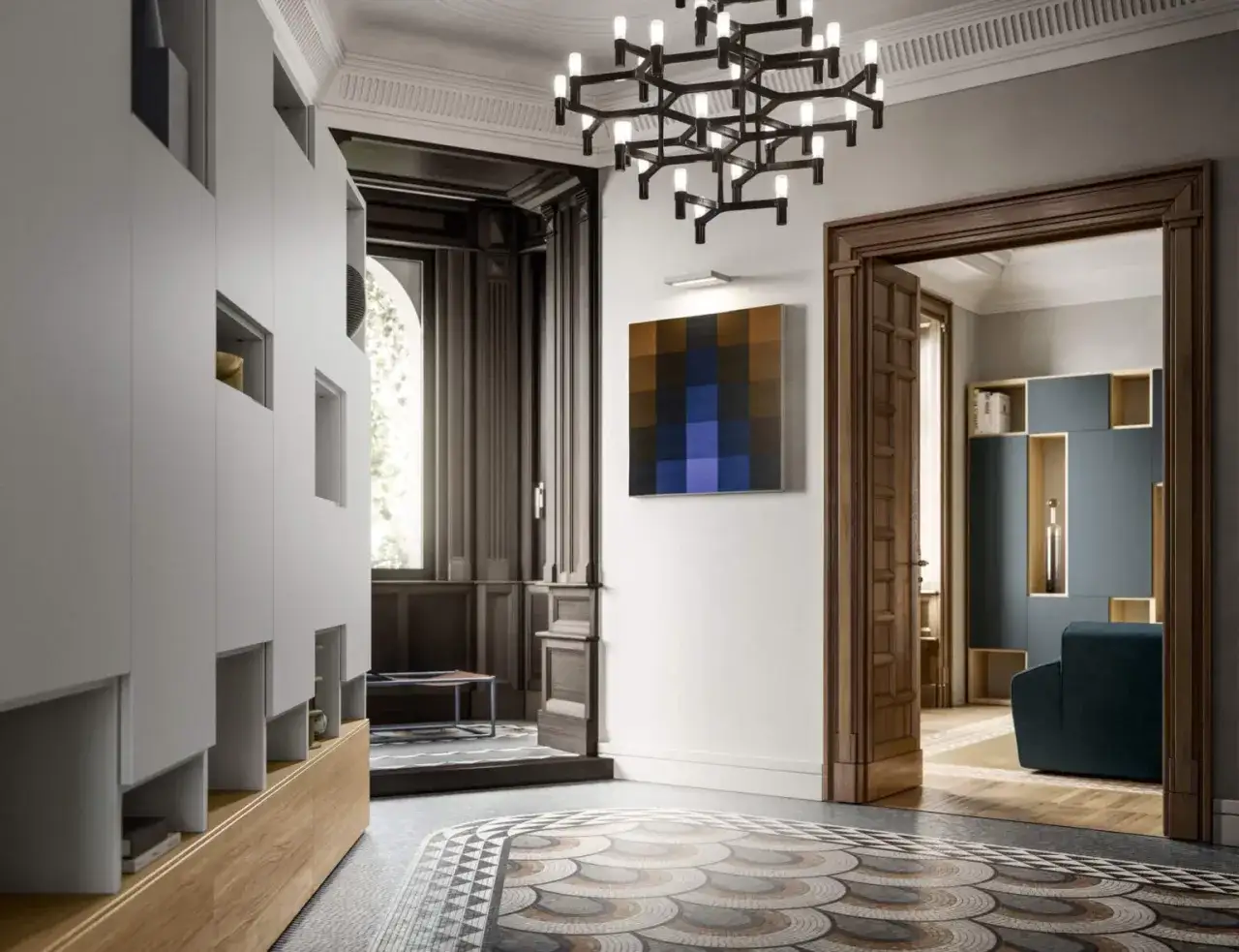 Ingresso con armadi modulari bianchi, un quadro astratto e un lampadario geometrico, in un ambiente che evoca lo stile liberty moderno.