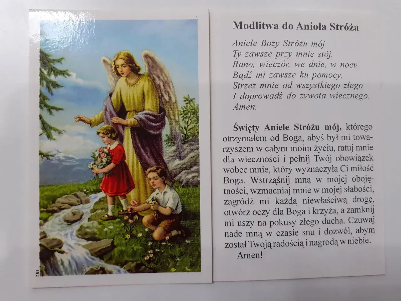 Anioł Stróż prowadzi dzieci przez strumień. Obok modlitwa 