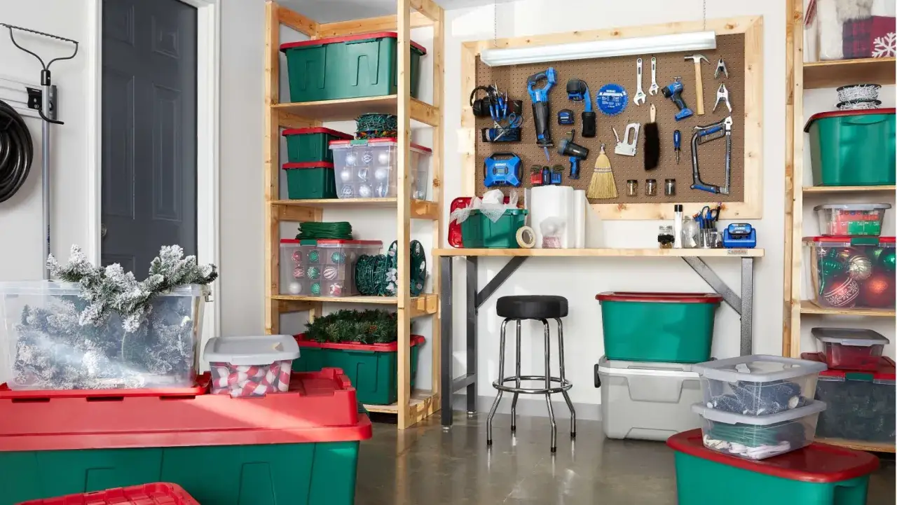 Organized basement storage ideas with clear bins and green/red totes holding holiday decorations and tools.