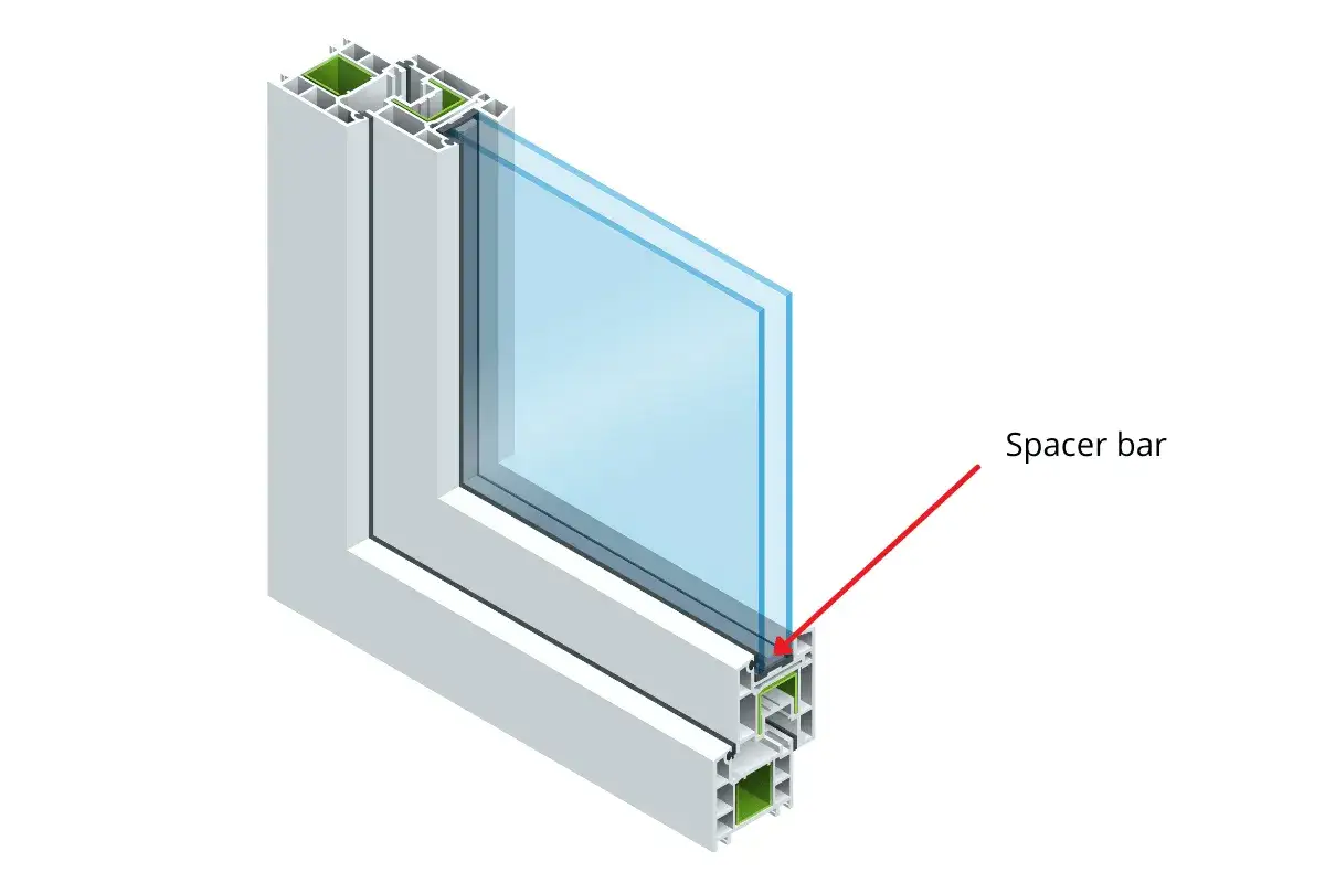 Corte de ventana con doble acristalamiento, mostrando el perfil intercalario que separa los vidrios para un aislamiento t&eacute;rmico &oacute;ptimo.