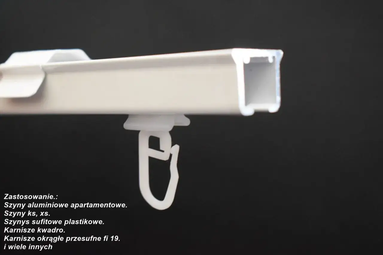 Biały ślizg do szyny sufitowej, idealny do karniszy aluminiowych i plastikowych.