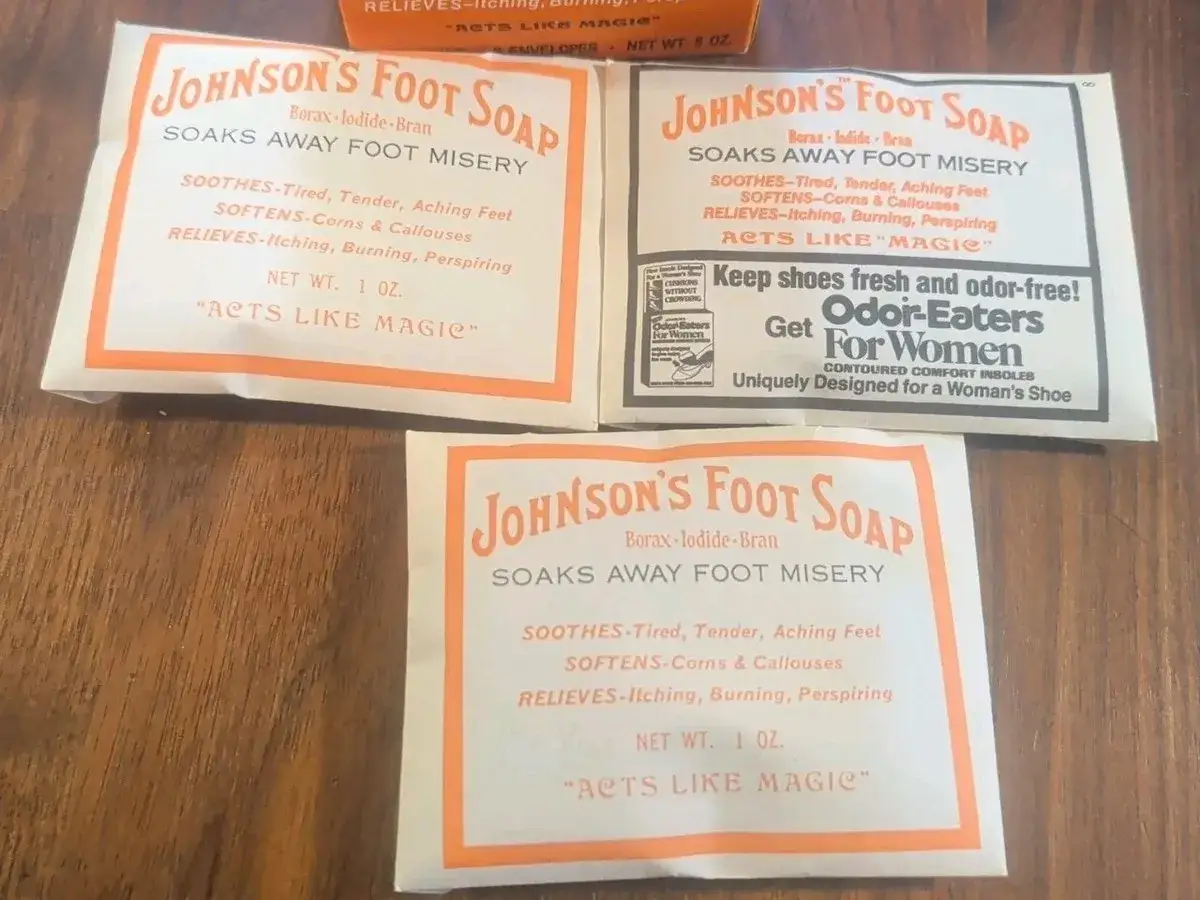 Three vintage Johnson's Foot Soap packets, promising relief for foot misery with a