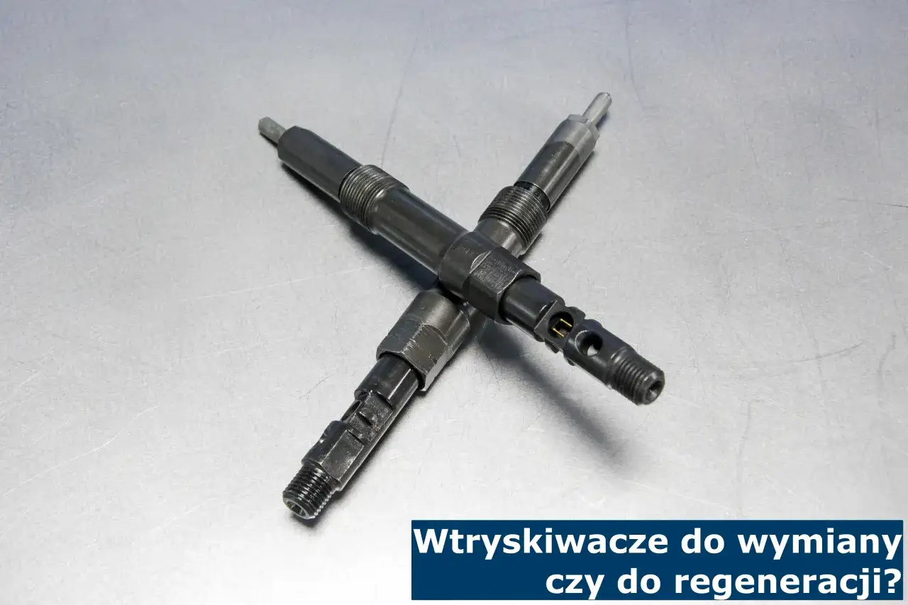 Dwa wtryskiwacze gazu leżące na metalowej powierzchni. Uszkodzony wtrysk gazu objawy mogą być różne, ale często wymagają wymiany lub regeneracji.