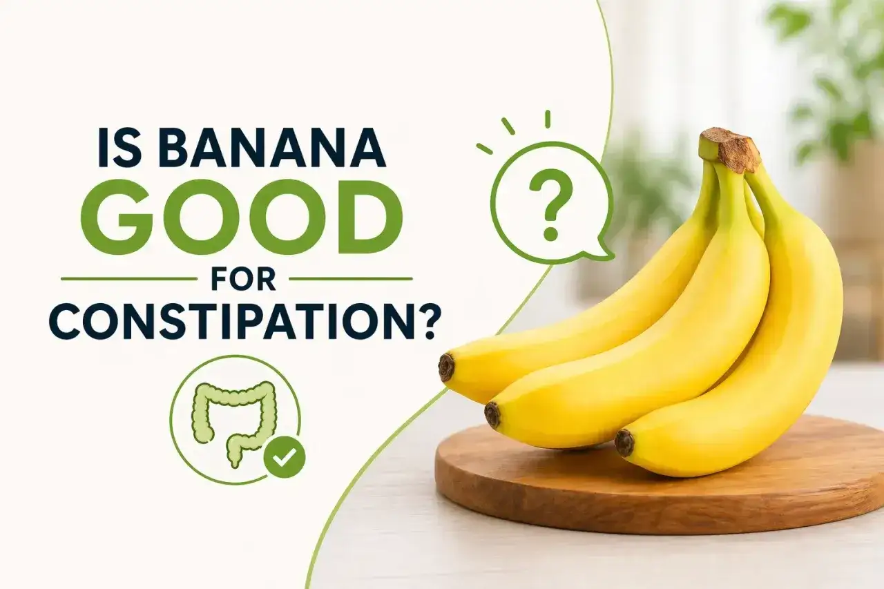 Czy banany powodują zaparcia? Na zdjęciu pęk bananów i grafika jelit z zaznaczonym ptaszkiem.