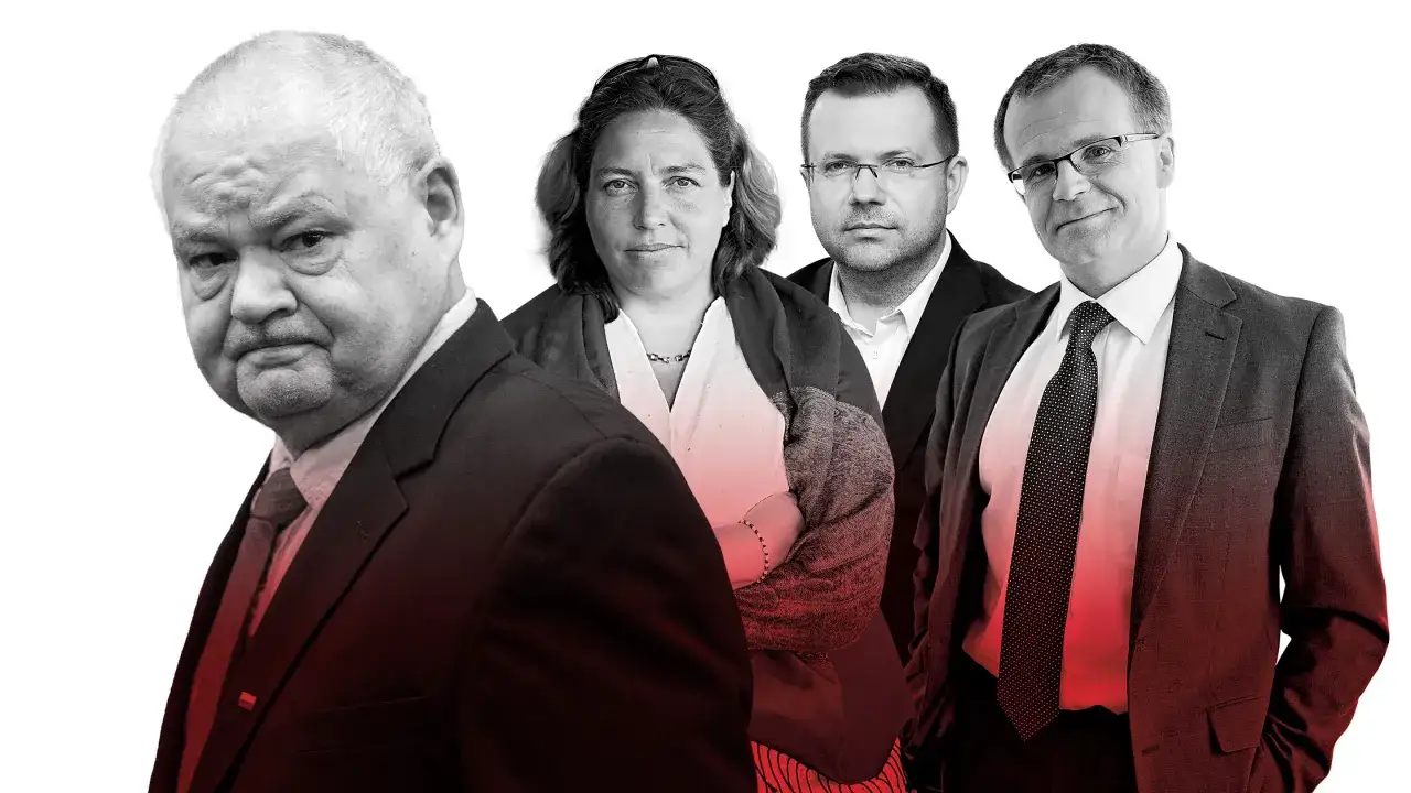Grupa osób w garniturach, w tym mężczyzna z przodu, który wygląda na zamyślonego. To oni decydują, kto ustala stopy procentowe.