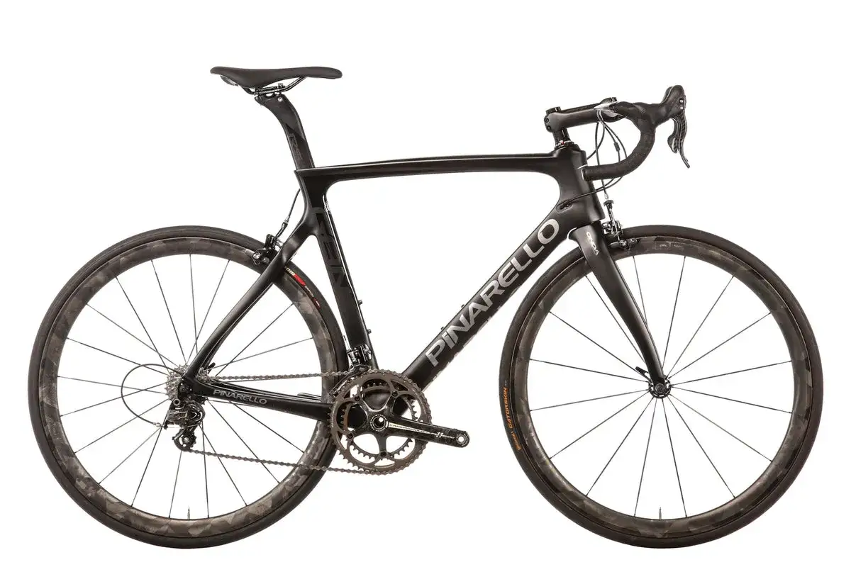 Sleek black Pinarello Gan RS road bike with carbon wheels, ready for speed.