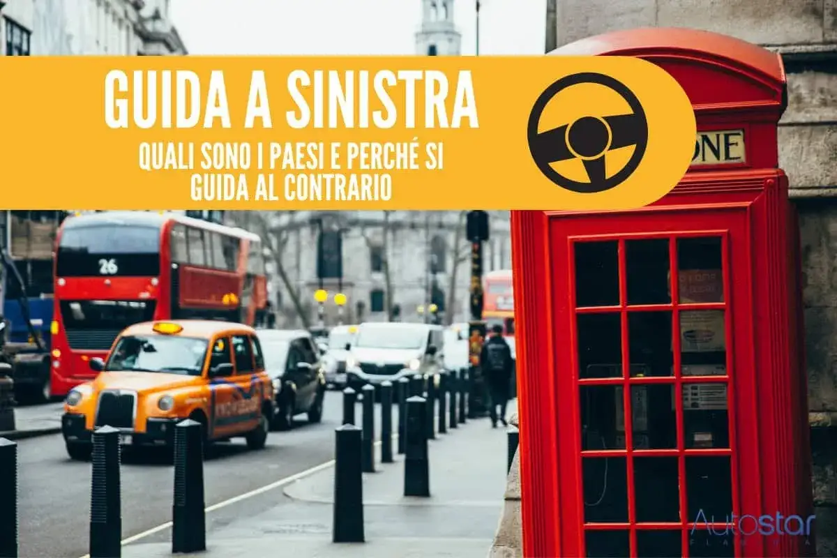 Iconica cabina telefonica rossa e traffico londinese con autobus a due piani e taxi. Scopri i paesi con guida a sinistra e le ragioni di questa scelta.