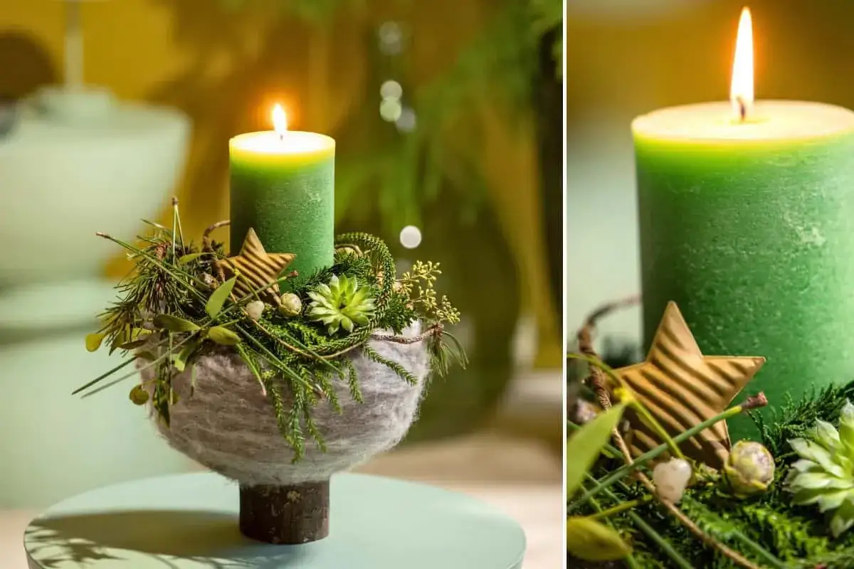 Gr&uuml;ne Kerze mit Stern und Tannenzweigen, ein Symbol f&uuml;r den christlichen gesegneten 1. Advent.