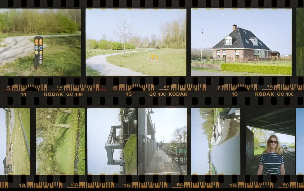 A contact sheet from a half frame camera shows a path, a house, a canal, and a woman.
