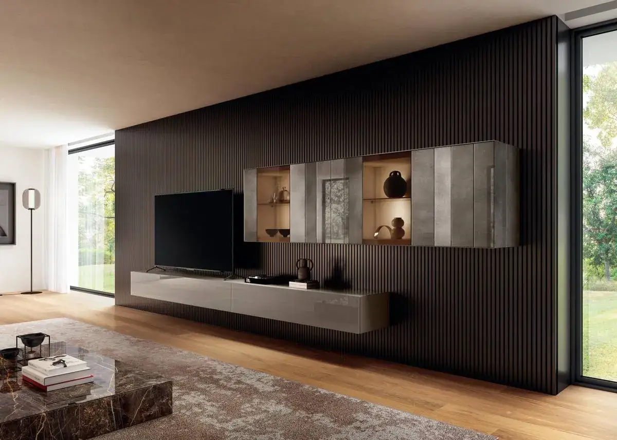 Elegante parete attrezzata moderna con pensili contenitori e mobile TV sospeso. Ispirazione per come arredare una parete attrezzata moderna.