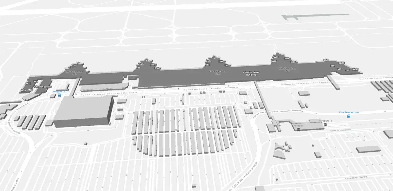 Widok z lotu ptaka na lotnisko Barcelona El Prat, z widocznymi terminalami T2A, T2B, T2C, parkingami i drogami.
