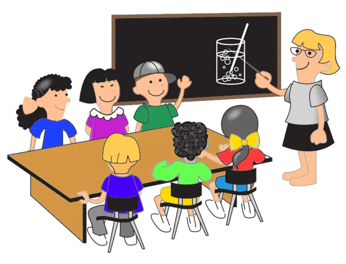 Un grupo de ni&ntilde;os en clase, con la maestra explicando en la pizarra. Un ejemplo de sociograma primaria.