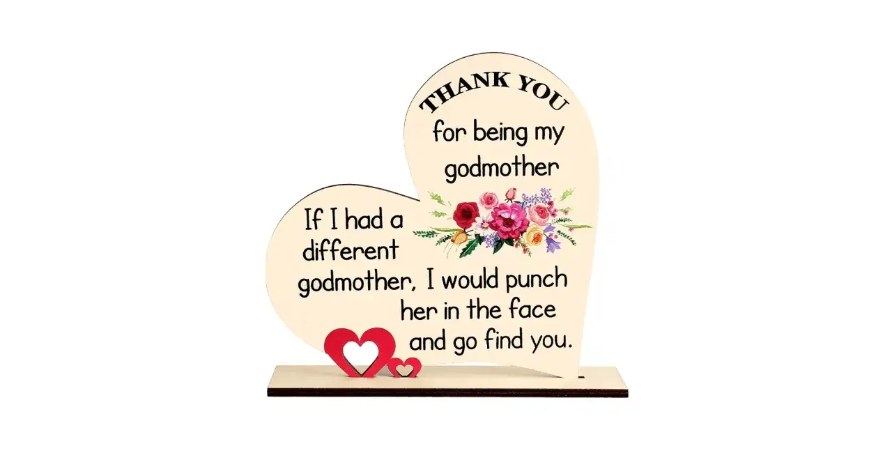 Corazón de madera con flores y texto: 