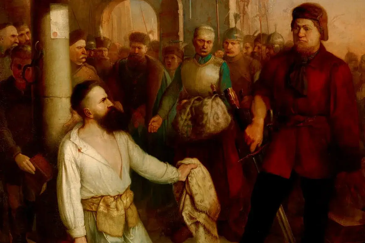 Scena z obrazu: mężczyzna w białej koszuli, otoczony przez żołnierzy, być może czeka na wyrok. Czy to infamia, co to za los?