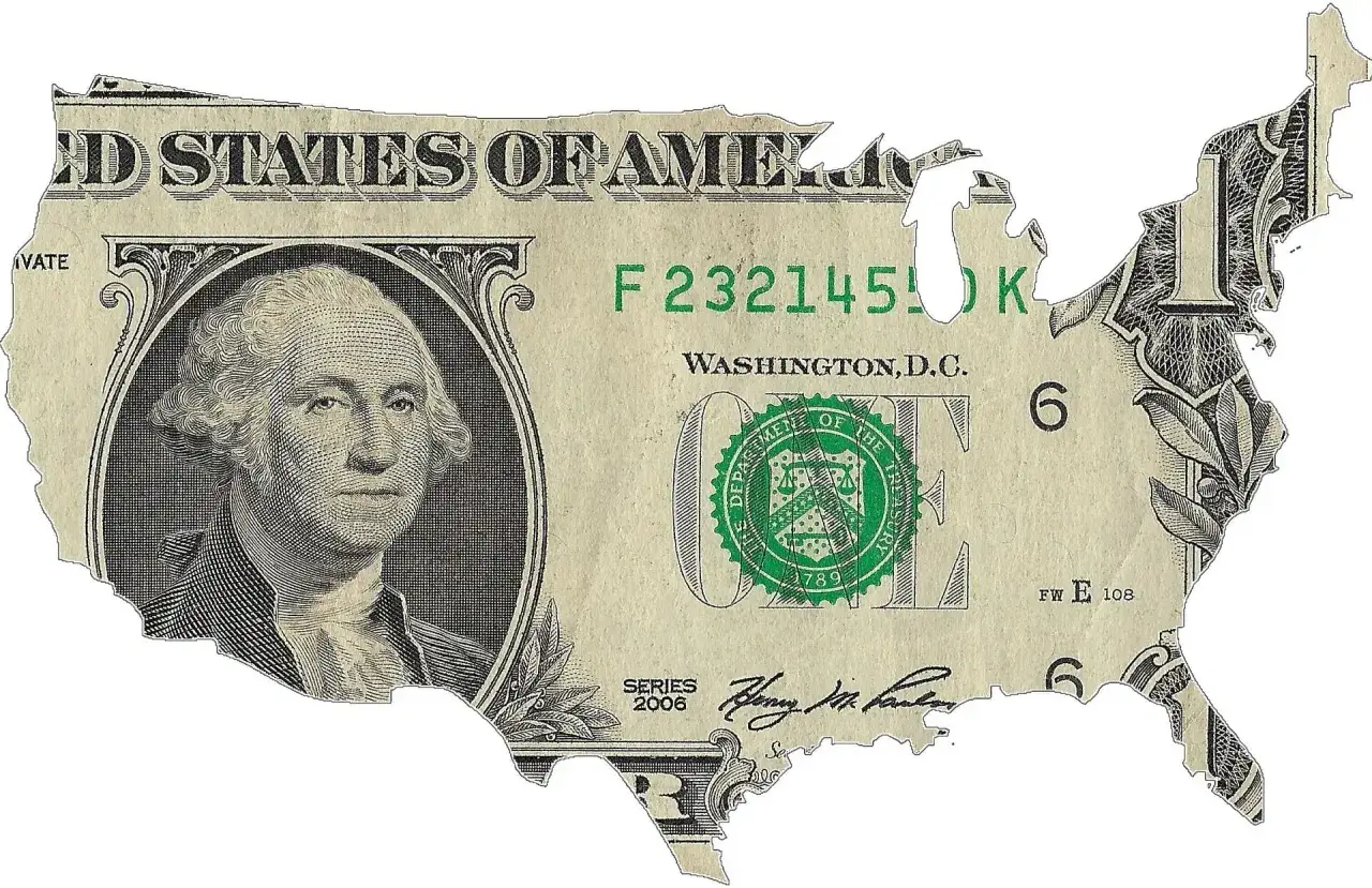 Kontury USA na banknocie jednodolarowym. USD jaka to waluta? To amerykański dolar, symbol potęgi gospodarczej.