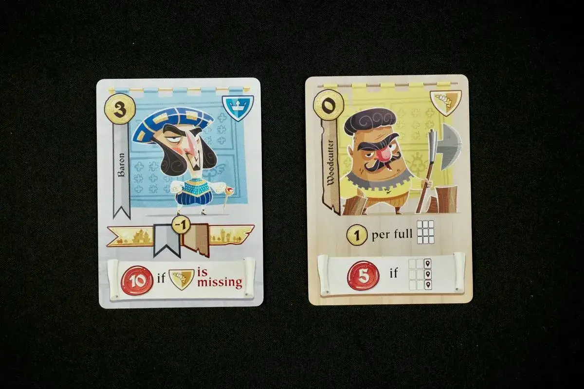 Carte da gioco: Barone (3 punti, -1 se manca) e Taglialegna (1 punto per ogni tessera completa, 5 punti se mancano). Un esempio di **regicide regolamento**.
