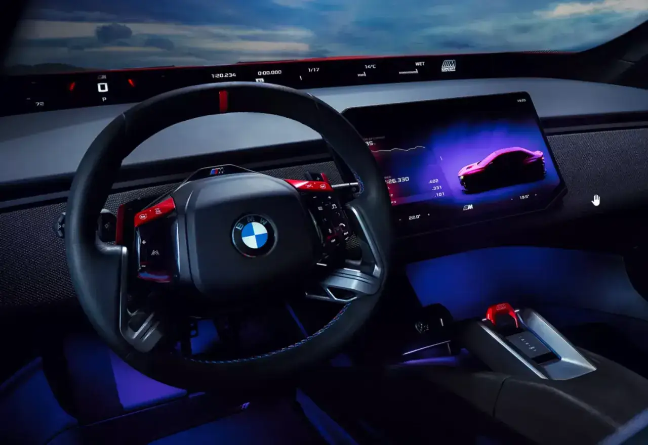 Wnętrze BMW Neue Klasse z nowoczesnym ekranem i kierownicą.