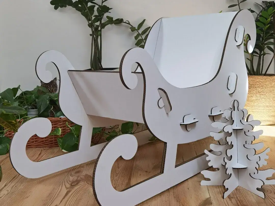kartonowe sanie Mikołaja różne style dekoracji
